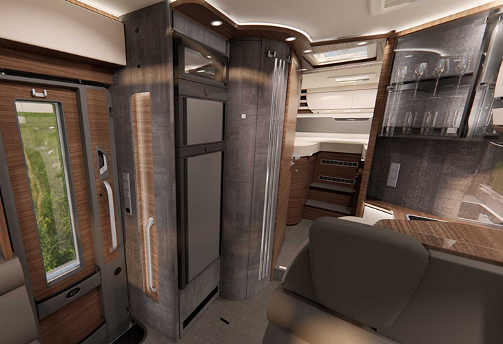 Carthago E-Line 50 LE Cortina 2027 model interior showing kitchen, TecTower storage and entrance door