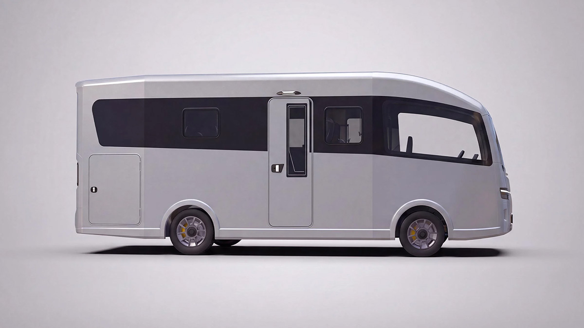 Side view of the electric Vöhringer CityFreighter campervan on a grey EV chassis, showing sleek exterior design.