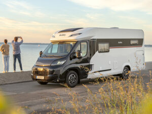 Hobby Prestige 2027 low-profile motorhome parked by the water