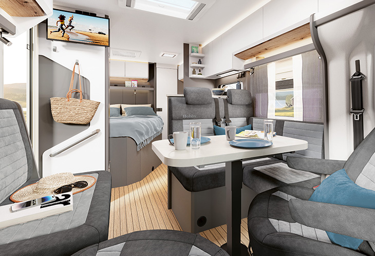 Interior of the Hobby Prestige T740 WF with L-shaped seating area and table