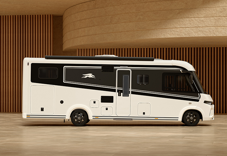 Laika Kreos H 5109 MB motorhome in black and white livery, side view showing sleek exterior design and living space windows.
