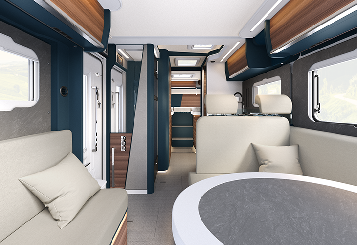 Laika Kreos H 5109 MB motorhome interior with Deep Ocean blue cabinetry, cream seating and round dinette table