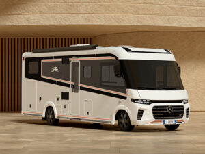 Laika Kreos H 5109 MB motorhome in white with rose gold accent stripe, Mercedes-Benz cab and front grille