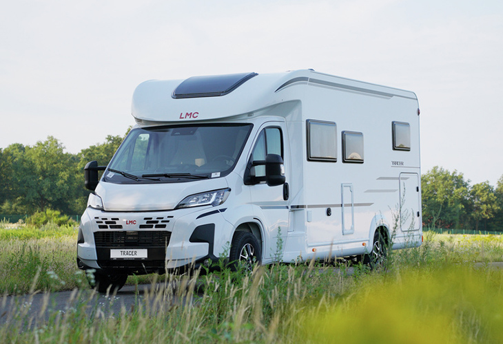 LMC Tracer motorhome with white chassis parked on rural road, part of LMC campers 2027 range