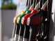 Colourful fuel pump nozzles at a Spanish filling station, highlighting diesel prices in Spain