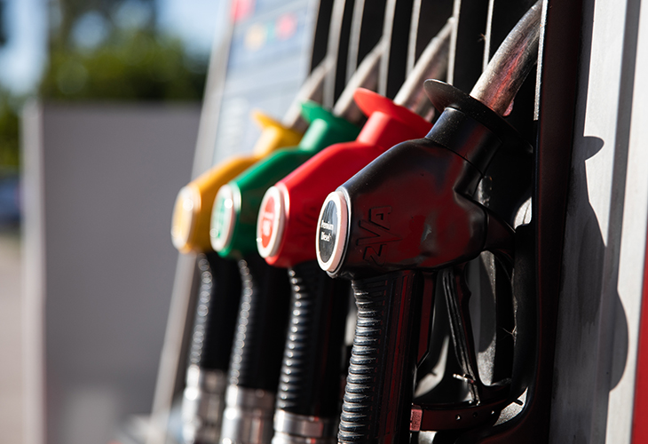 Colourful fuel pump nozzles at a Spanish filling station, highlighting diesel prices in Spain