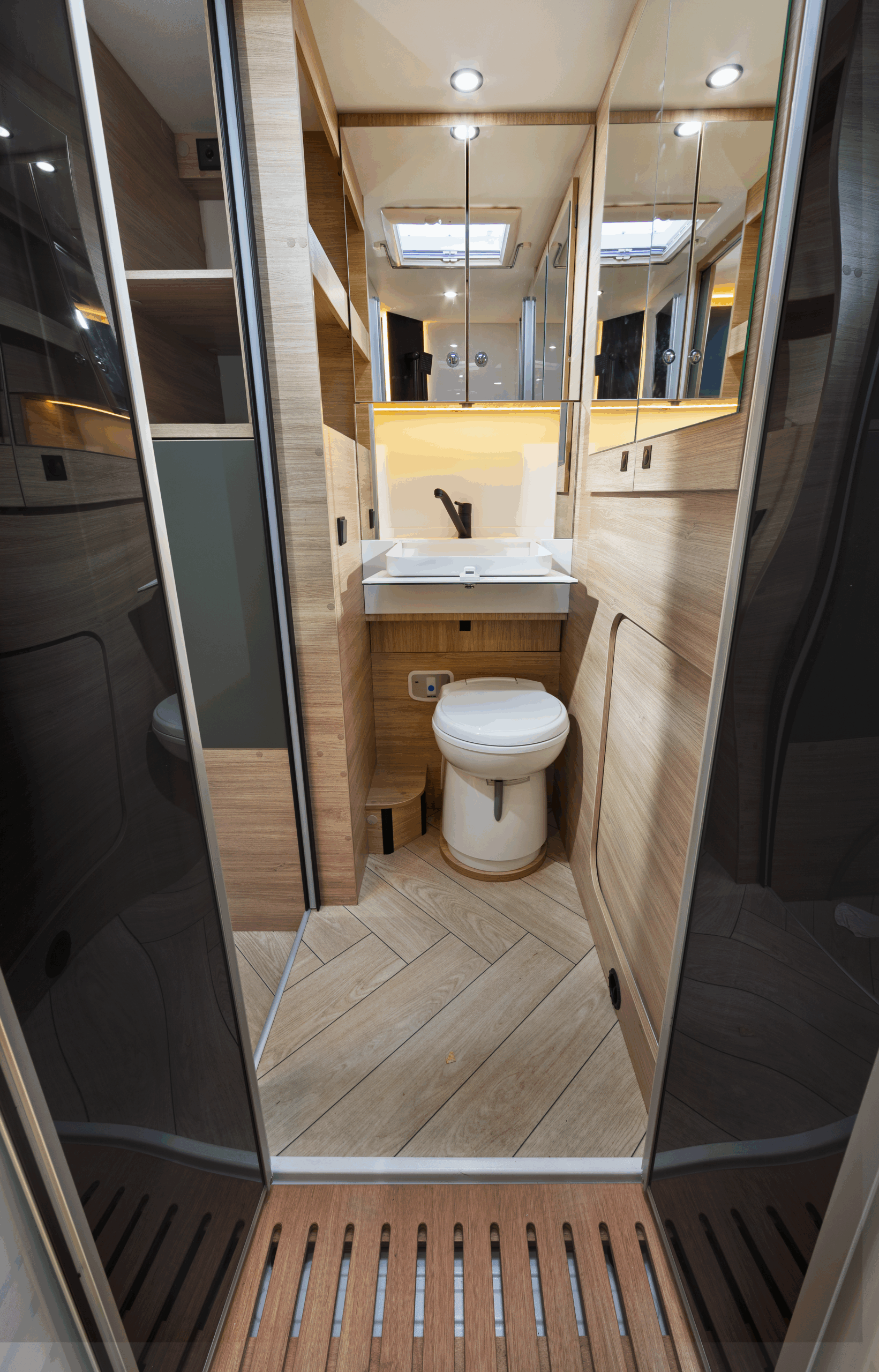 Spacious bathroom and wardrobe in slim Chausson X640 low-profile motorhome