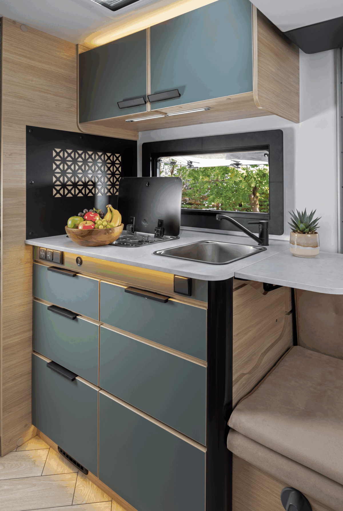 Spacious bathroom and wardrobe in slim Chausson X640 low-profile motorhome