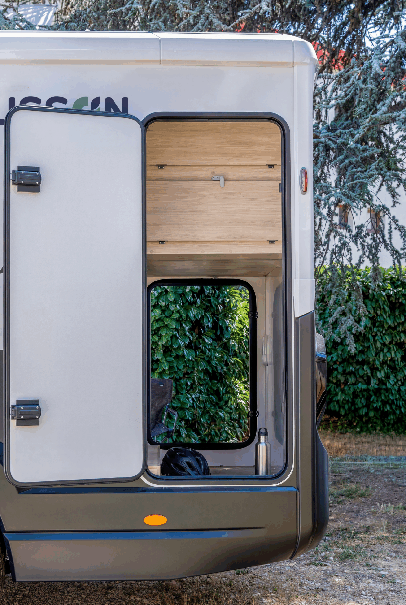 Spacious bathroom and wardrobe in slim Chausson X640 low-profile motorhome