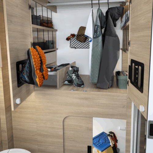 Spacious bathroom and wardrobe in slim Chausson X640 low-profile motorhome