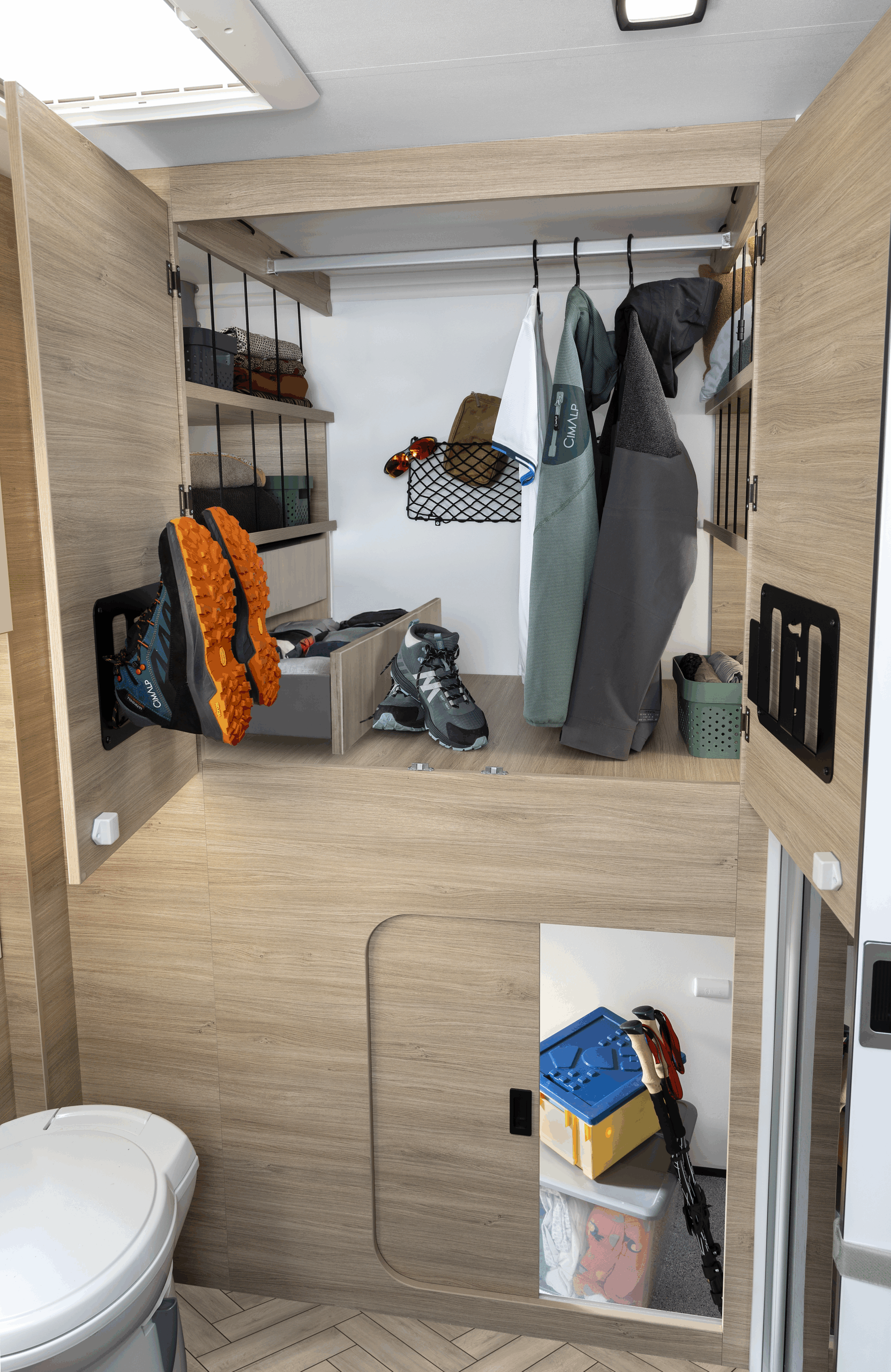 Spacious bathroom and wardrobe in slim Chausson X640 low-profile motorhome