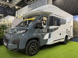 Benimar Kaleo K640 motorhome exterior, grey and white with black accents, on display at trade show