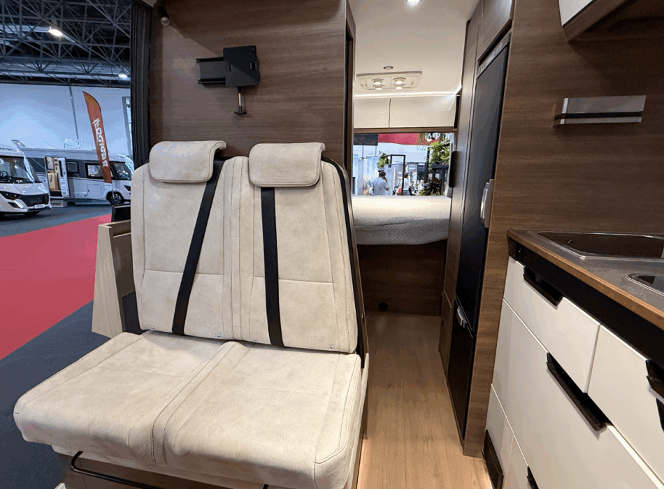 Island bed and unique dinette in a camper van? Check out the Rapido V64!