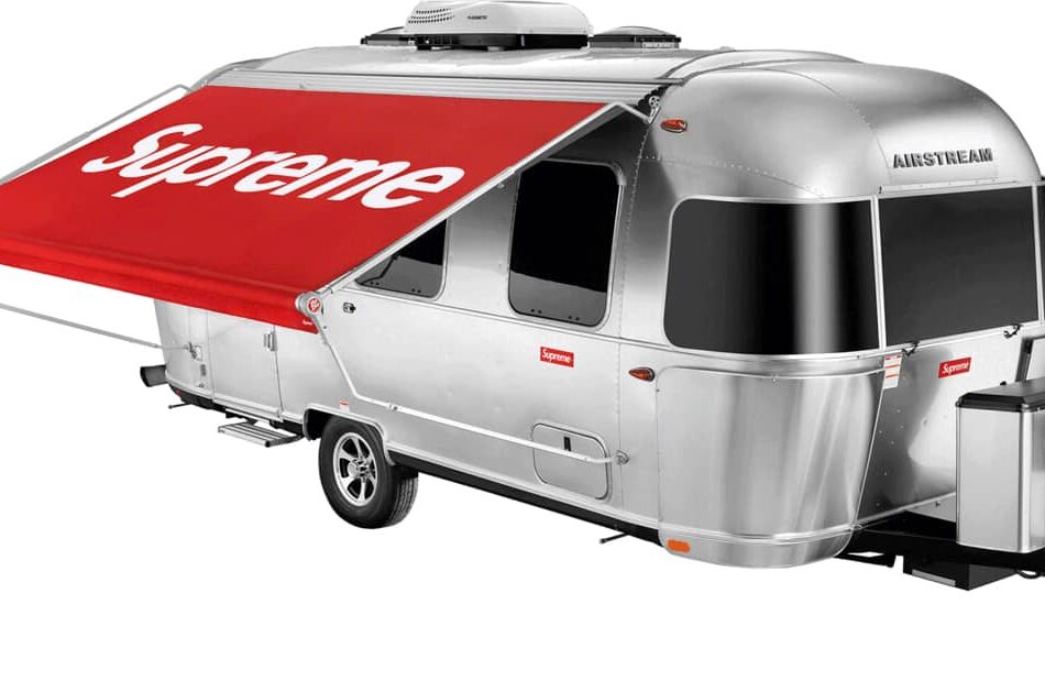 Erling Haaland Airstream travel trailer with extended red Supreme-branded awning and polished aluminium body