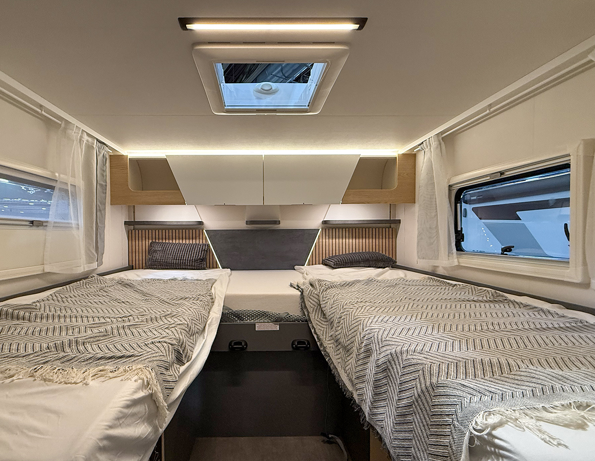 Ahorn Camp Eclipse TE 740 caravan interior showing single beds, inspired by the solar eclipse theme