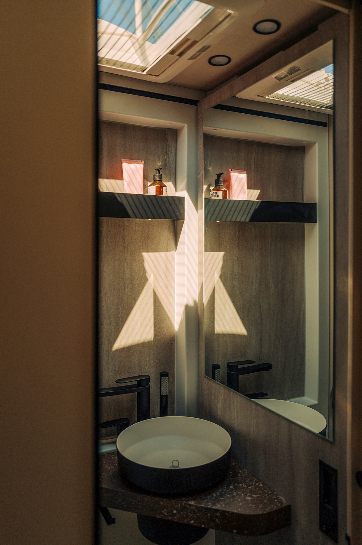 Bathroom interior of the Bürstner Signature Mercedes motorhome with stylish fittings